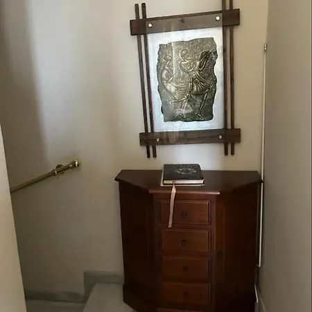 έν *